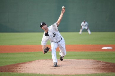 Reliever Kyle Hunter delivers a pitch on Saturday night. 