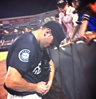 Steven Proscia signs autographs for fans after last night's walk-off winner. 