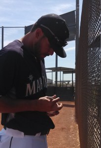 Stefen Romero signing autographs after batting practice Sunday. 