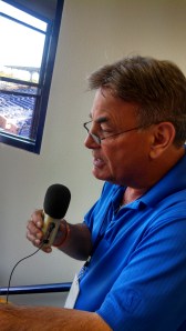 Rick Rizzs cutting a liner for the 2014 Generals broadcast